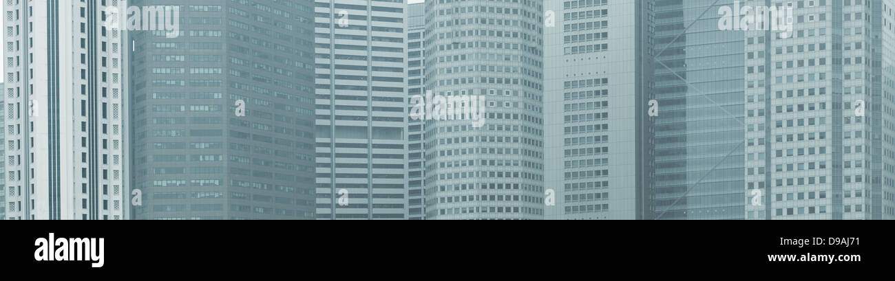 Arrière-plan panoramique - les fenêtres des immeubles de grande hauteur de la grande ville Banque D'Images