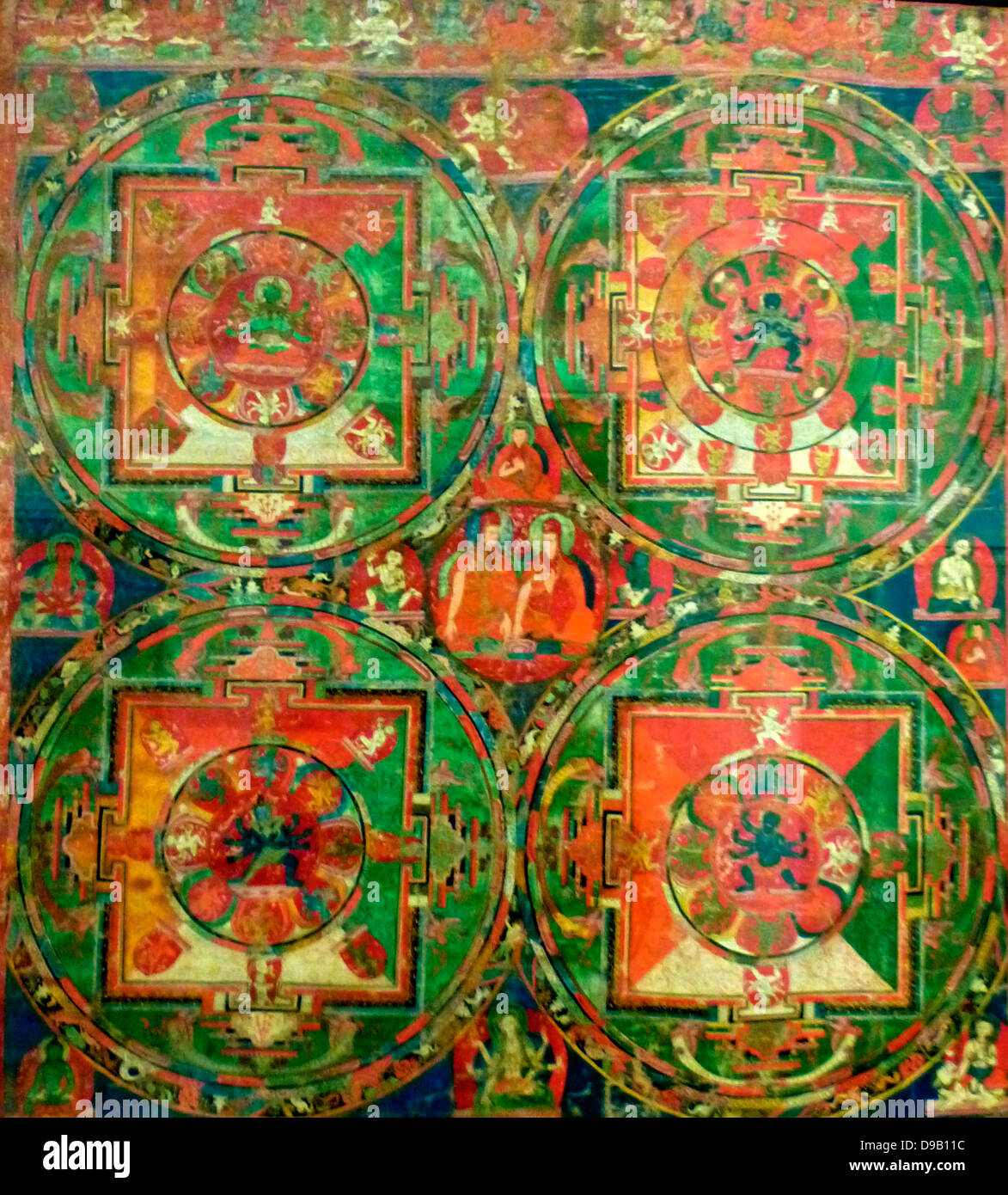 (Peinture) Thangka avec quatre Mandalas 1400-1500. Chacun de ces quatre mandalas, diagrammes ou rituel, représente un espace sacré. Banque D'Images