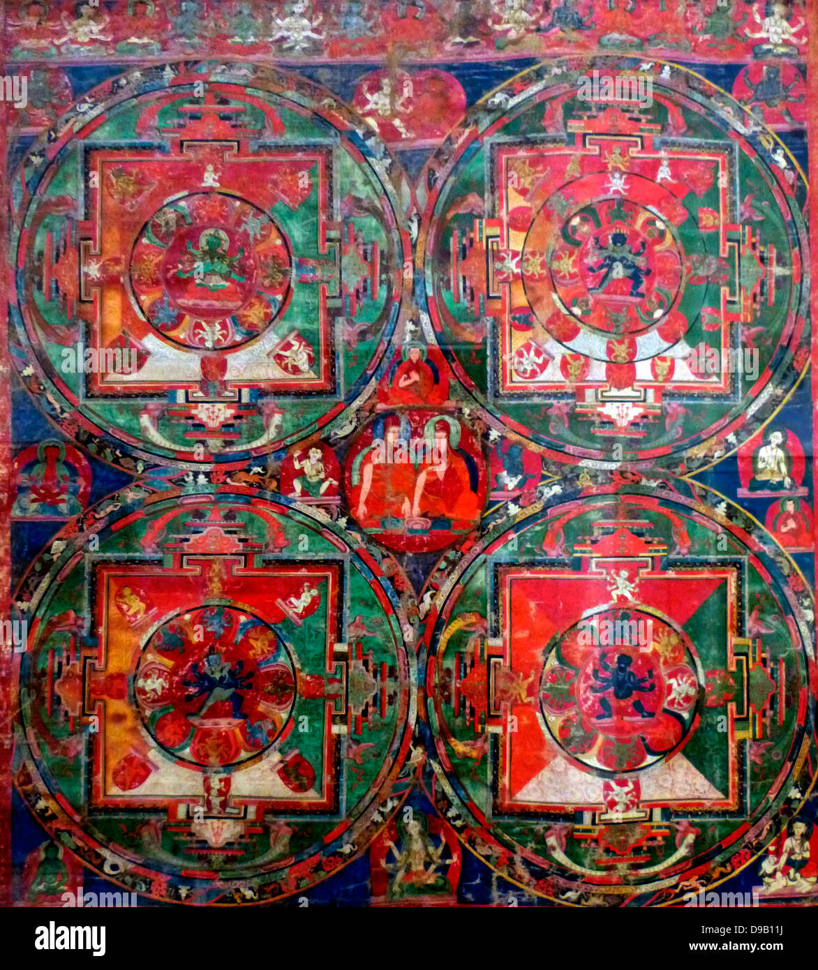 (Peinture) Thangka avec quatre Mandalas 1400-1500. Chacun de ces quatre mandalas, diagrammes ou rituel, représente un espace sacré. Banque D'Images