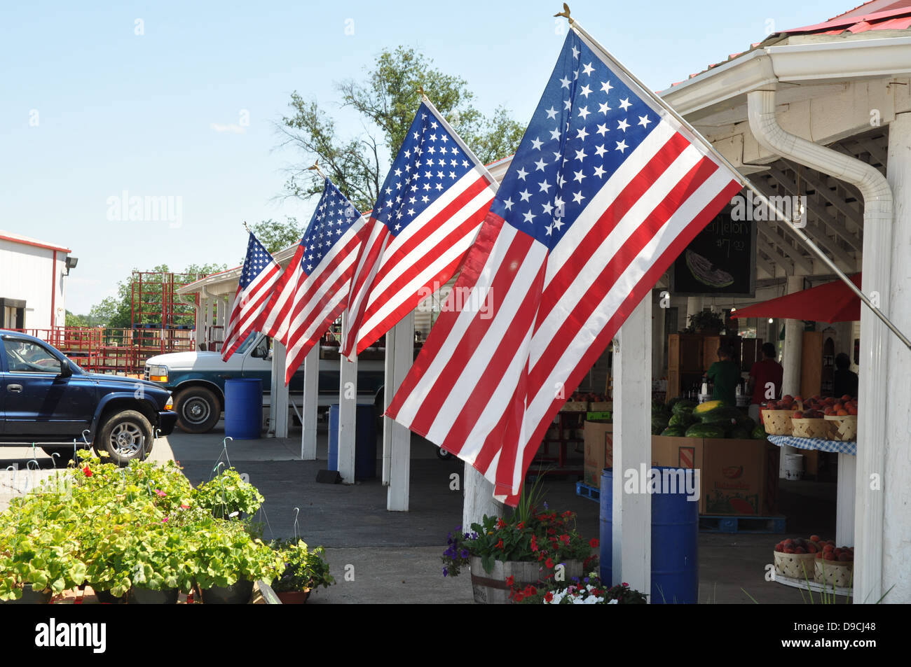 Des drapeaux américains à produire un stand en Caroline du Sud. Banque D'Images