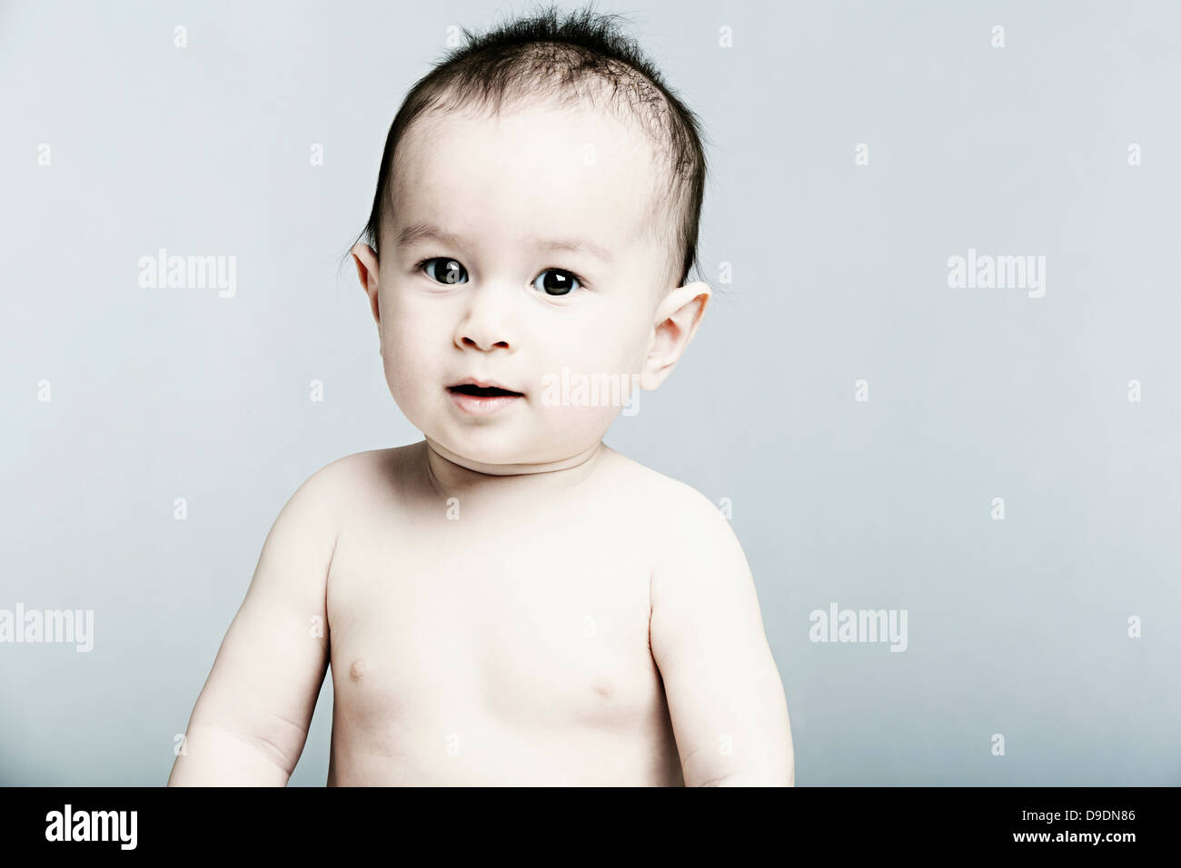 Portrait of baby boy looking at camera Banque D'Images
