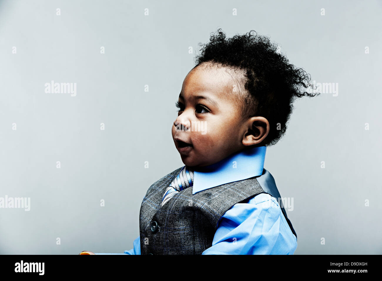 Portrait of baby boy wearing gilet, chemise et cravate Banque D'Images