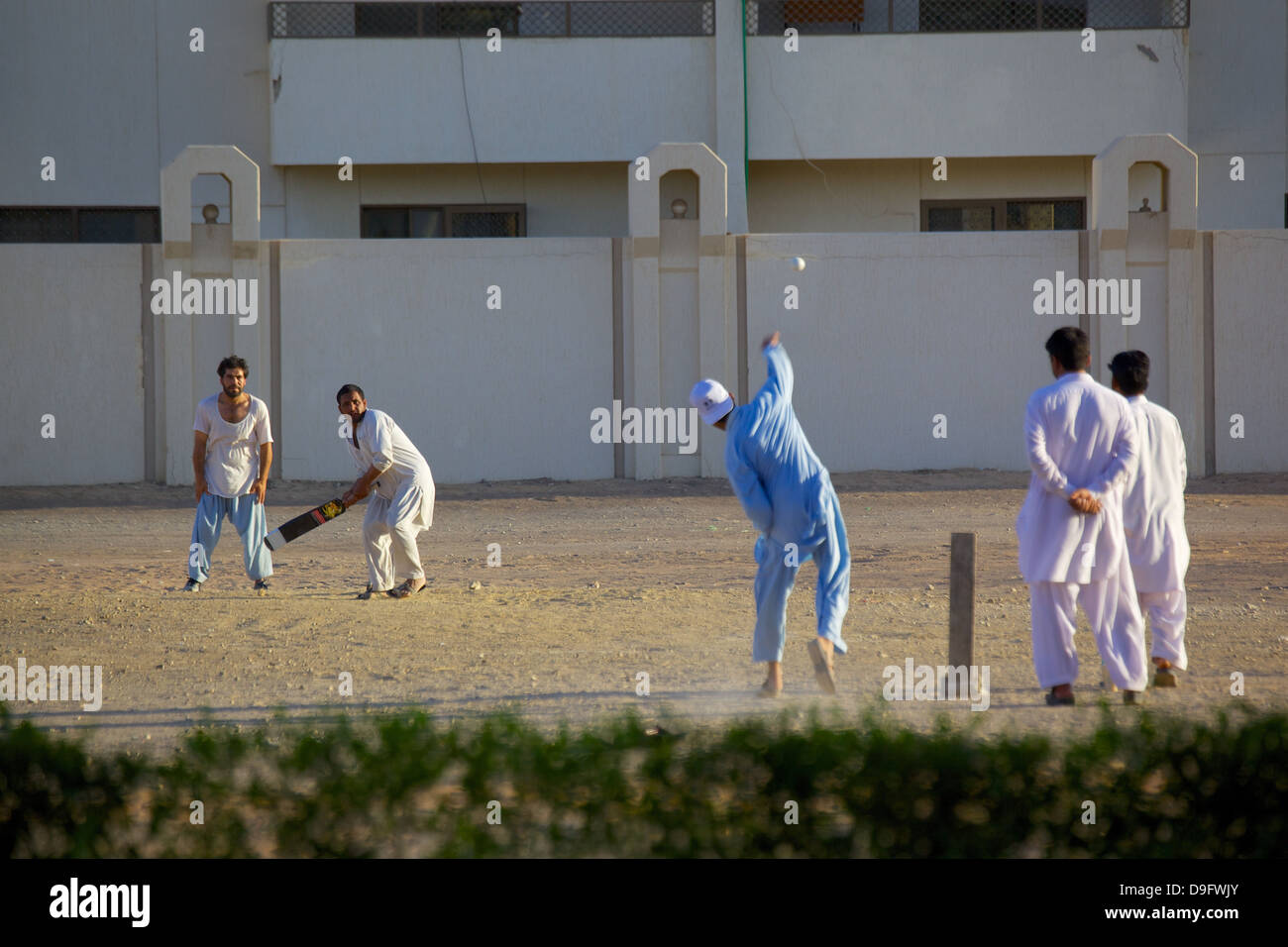 Match de cricket local, Al Ain, Abou Dhabi, Émirats arabes unis, Moyen Orient Banque D'Images