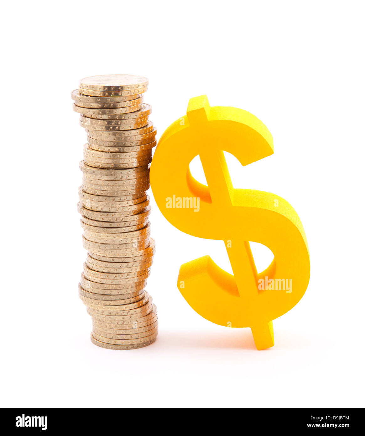 Pile de pièces d'or et symbole du dollar Banque D'Images