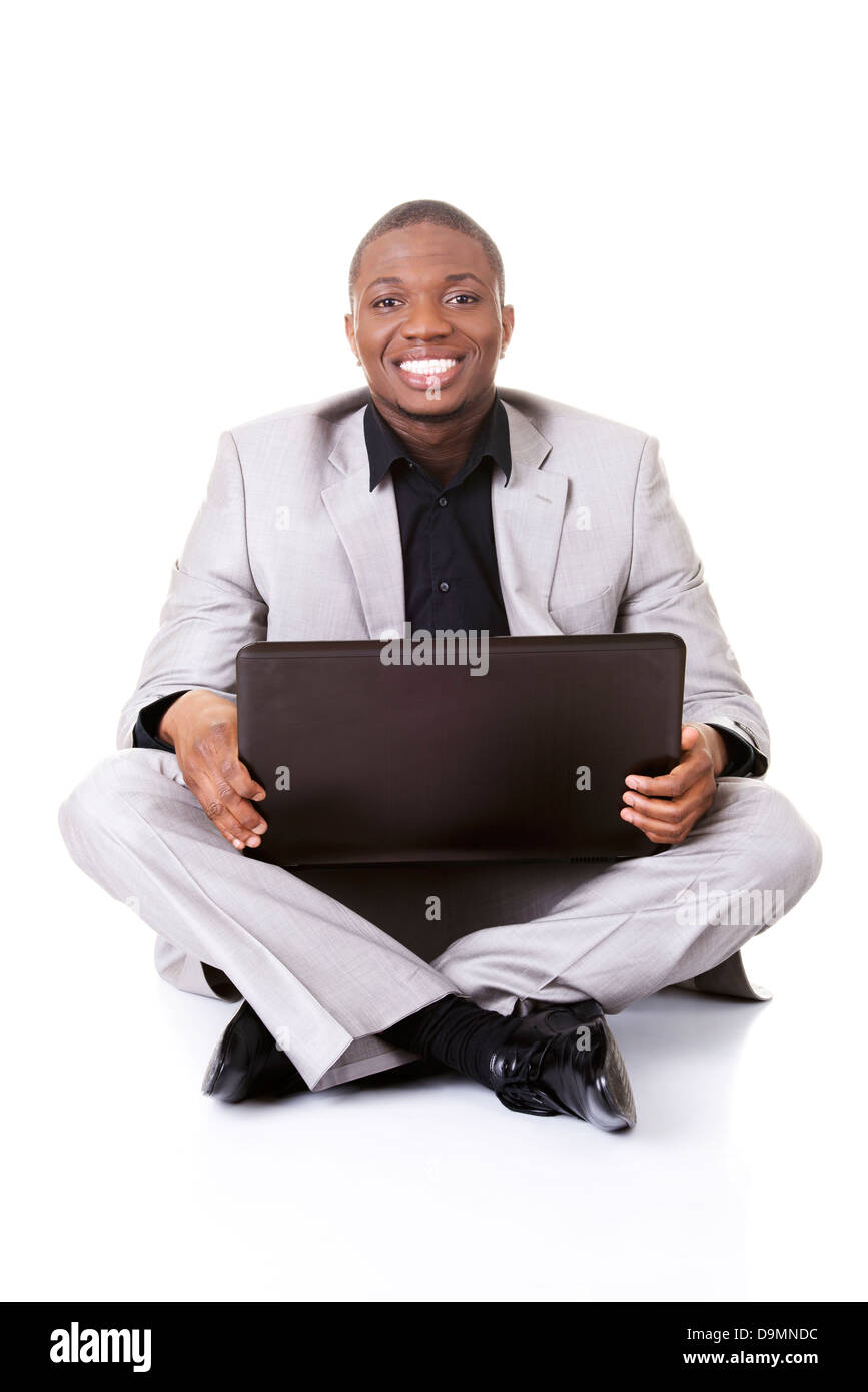 Les businessman working on laptop, isolated on white Banque D'Images