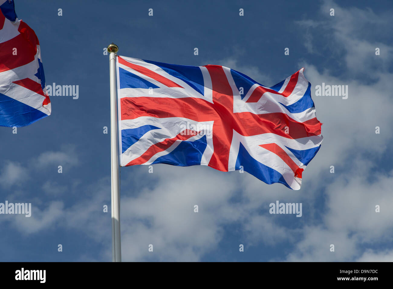 Union Jack Flag Flying sur mât. Drapeau britannique Banque D'Images