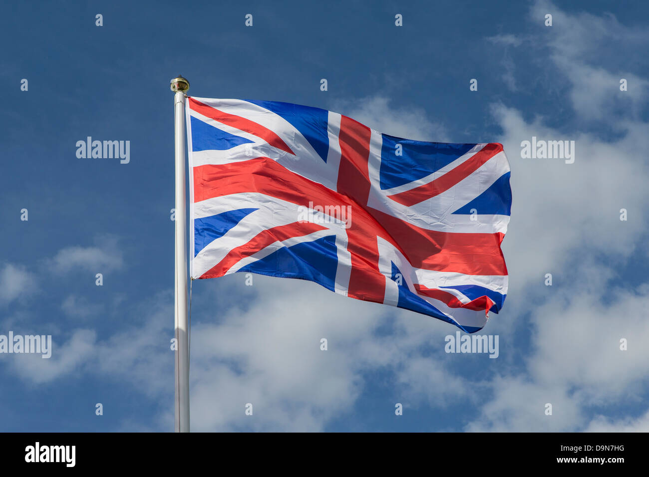 Union Jack drapeau sur mât Blowing in Wind Banque D'Images