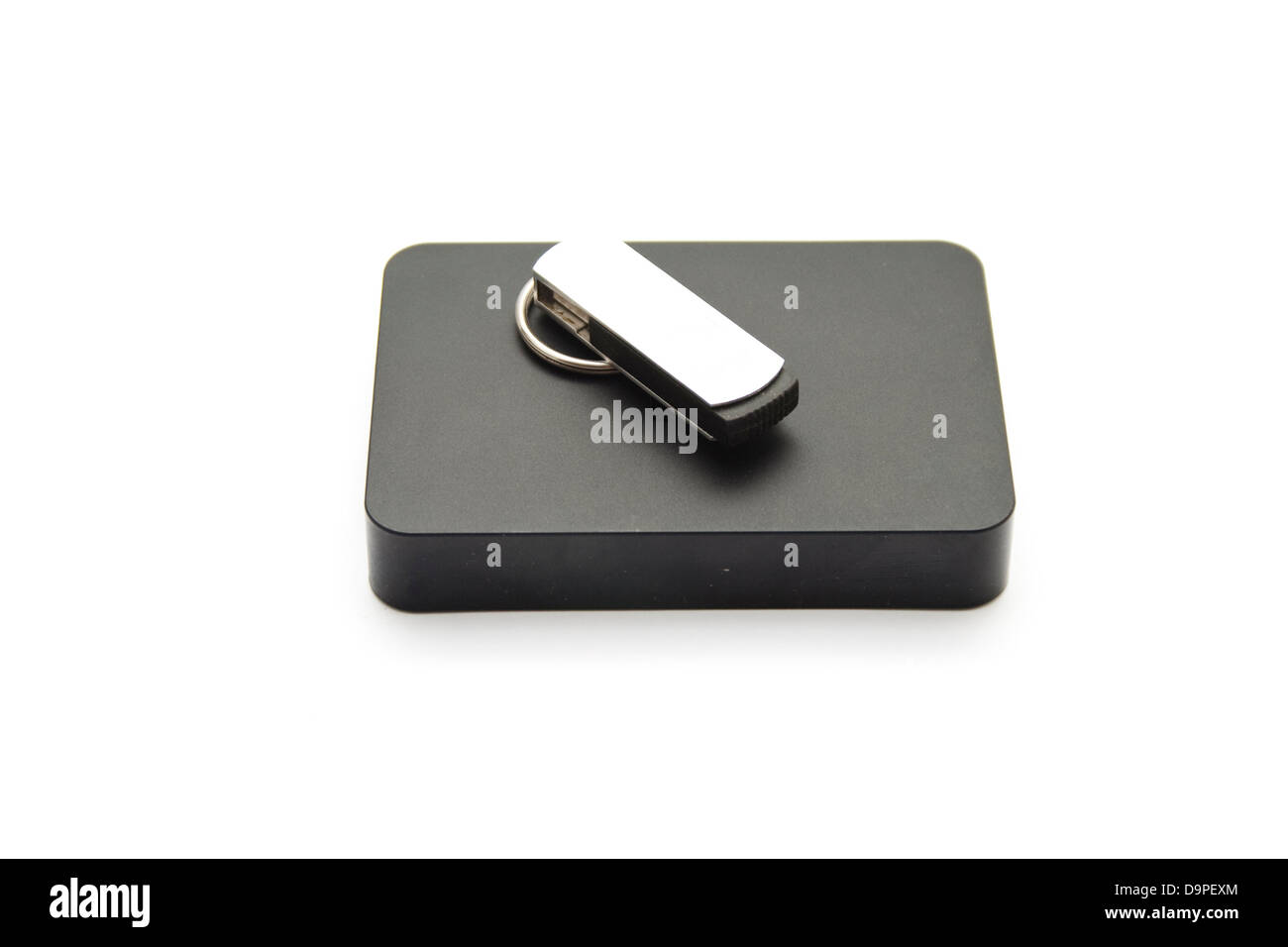 Disque dur externe disque avec clé USB sur fond blanc Banque D'Images