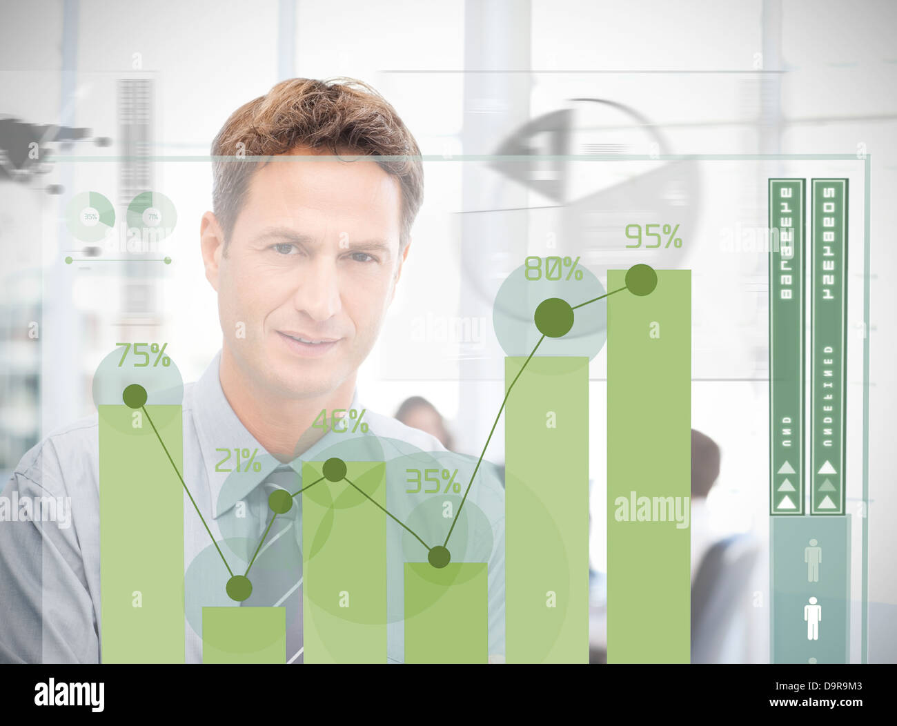 Businessman looking at green chart interface Banque D'Images
