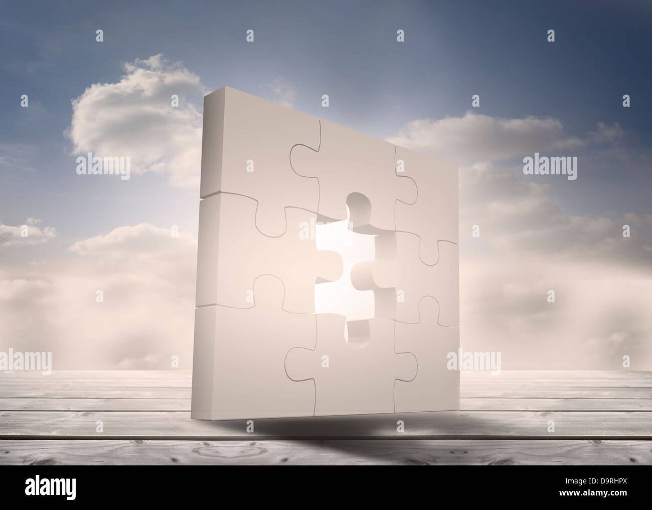 Unfinished puzzle debout sur les planches dans le ciel Banque D'Images Unfinished puzzle debout sur les planches dans le ciel Banque D'Images