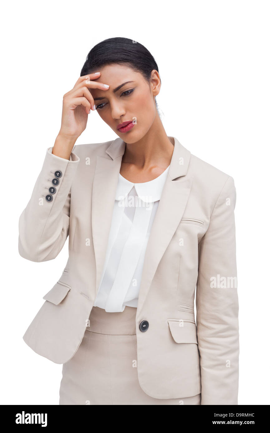 Inquiets businesswoman holding sa tête Banque D'Images