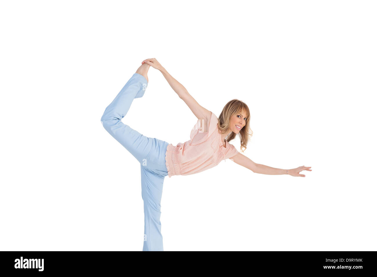 Blonde woman in dance classic position Banque D'Images