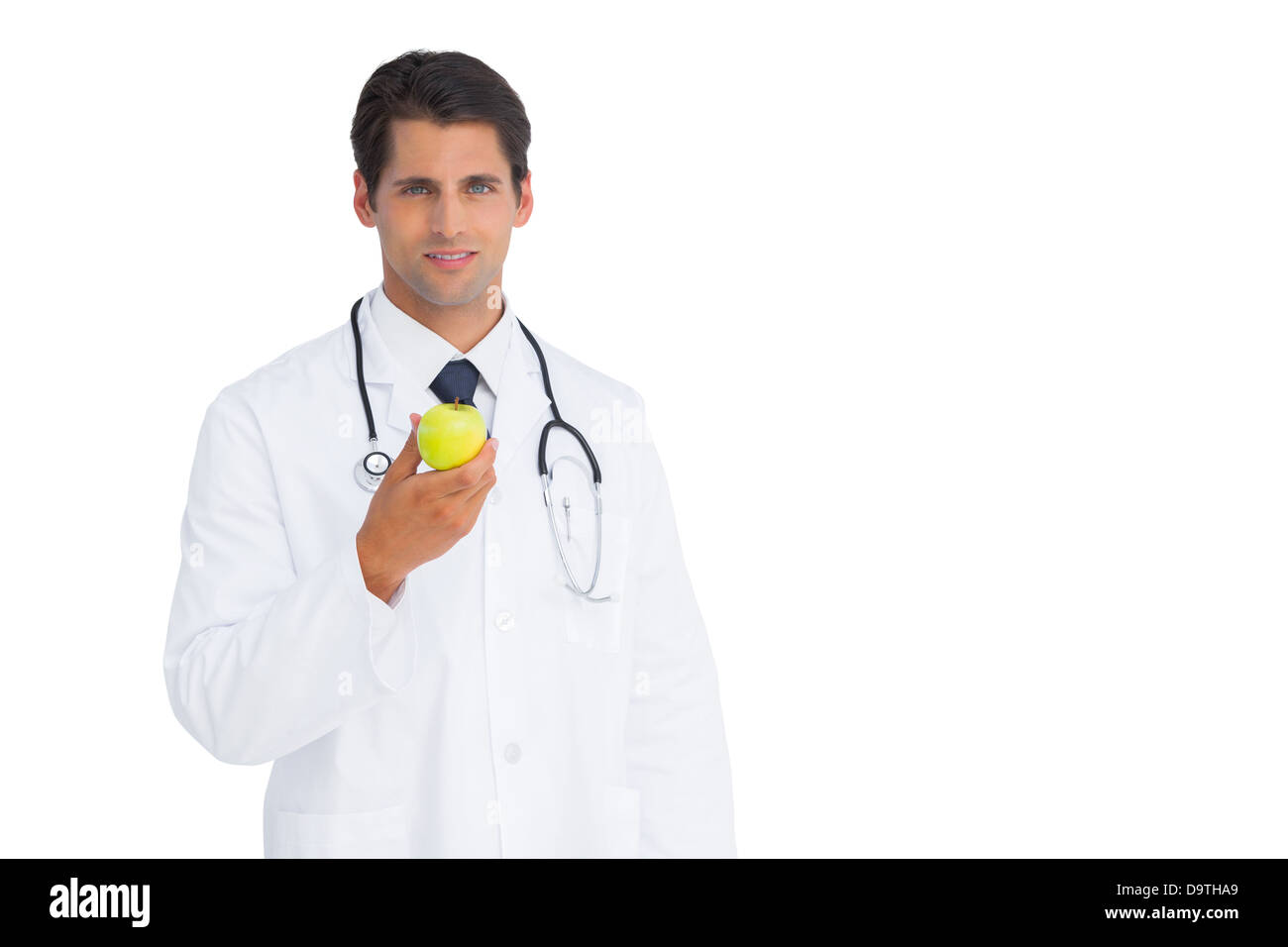 Doctor holding an apple Banque D'Images
