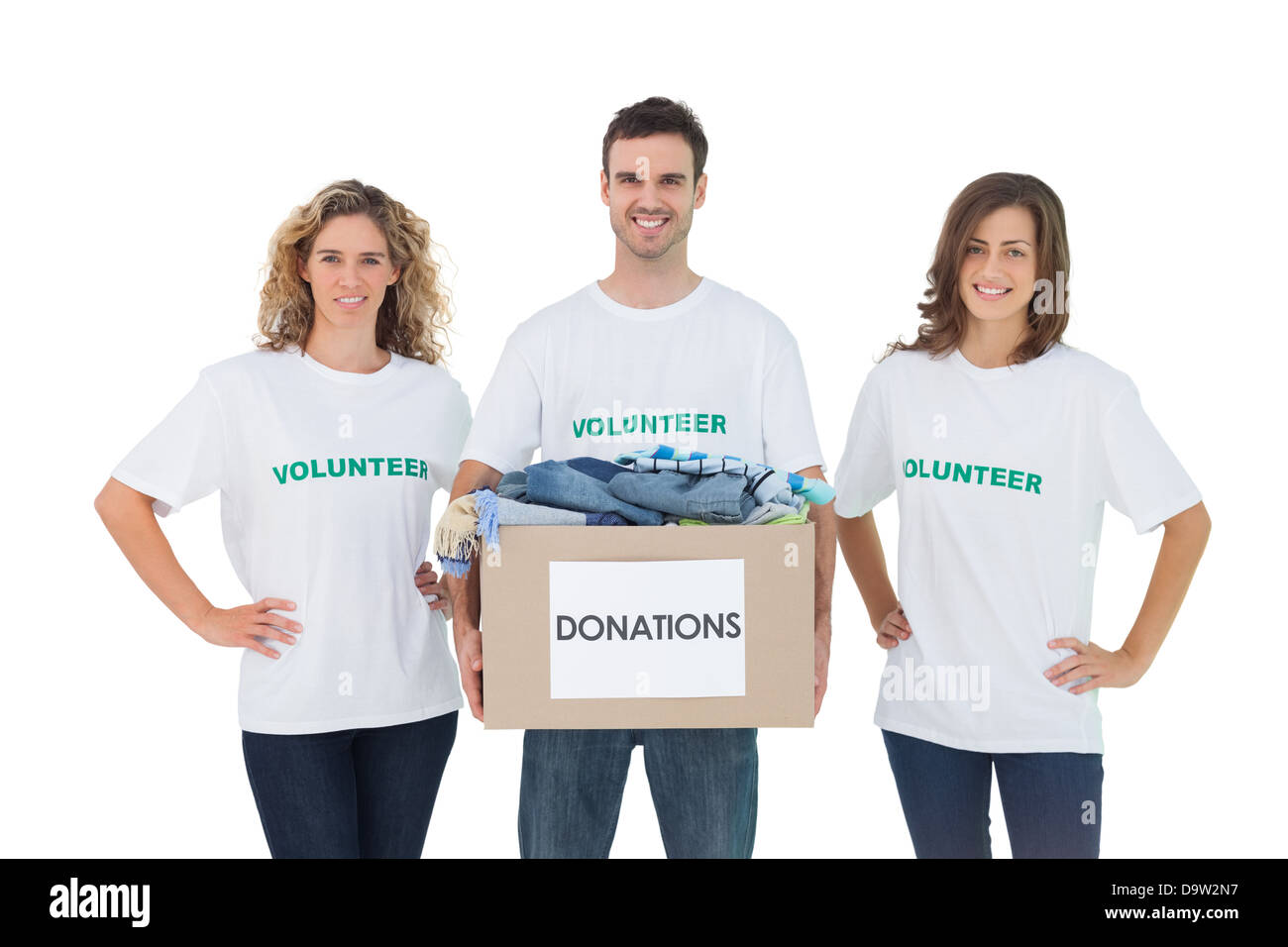 Groupe de bénévoles Smiling holding donation box Banque D'Images