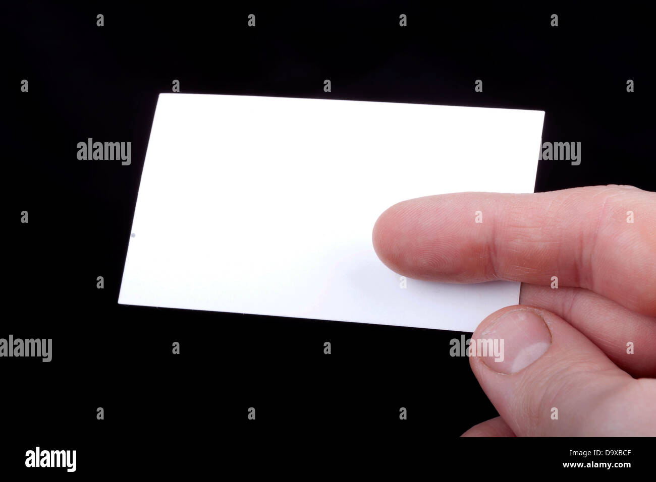 Man hand holding a blank business card. Banque D'Images