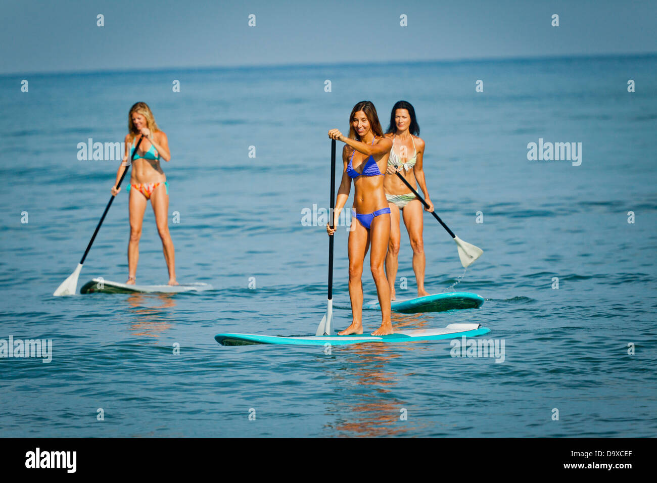 Trois femmes sur paddle boards Banque D'Images