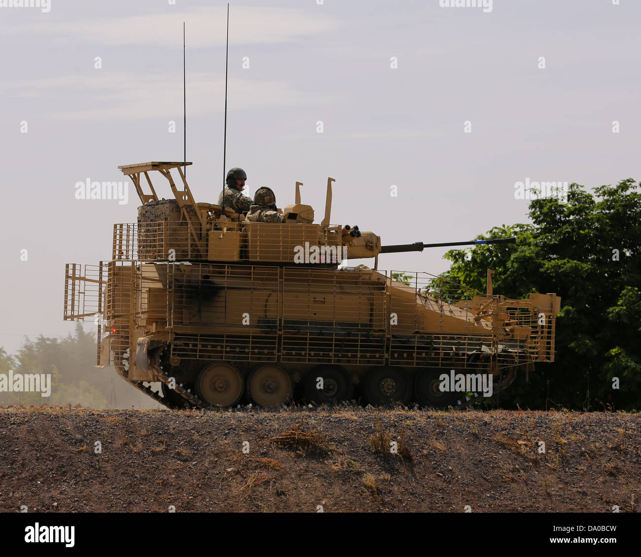 Bovington, UK. 29 Juin, 2013. Le FV107 Scimitar est un véhicule blindé de reconnaissance (parfois considéré comme un char léger) utilisé par l'armée britannique. Il est très similaire à l'A3 mais monte un 30 mm à haute vélocité HARTFORD L21 au lieu d'un canon de 76 mm canon. Il a été délivré à Corps Blindé Royal, dans les régiments blindés de reconnaissance. Chaque régiment avait un escadron de reconnaissance près de 5 troupes de 8 FV107 Scimitar. Banque D'Images