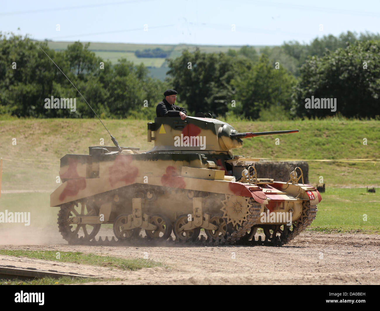 Bovington, UK. 29 Juin, 2013. Le M3 Stuart, officiellement, Light Tank M3 est un char léger de la Seconde Guerre mondiale. Il a été fourni à la et du Commonwealth avant l'entrée des États-Unis dans la guerre. Par la suite, il a été utilisé par les forces de la guerre. Le nom général donné par Stuart Stuart ou les Britanniques vient de la guerre civile américaine général confédéré J.E.B. Stuart et a été utilisé pour le M3 et le dérivé M5 Light Tank. Banque D'Images