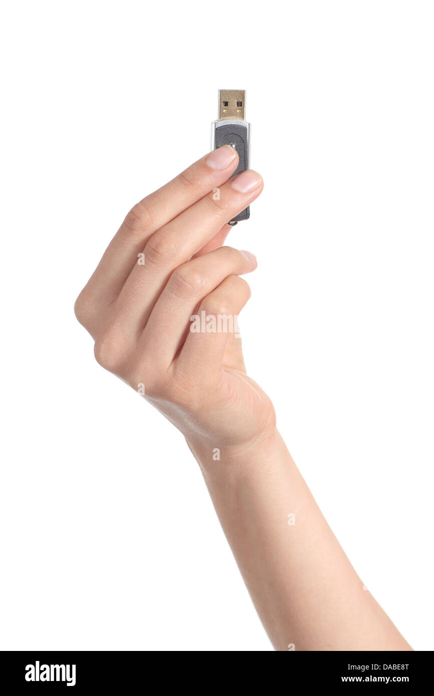 Woman hand holding up un lecteur flash isolé sur fond blanc Banque D'Images