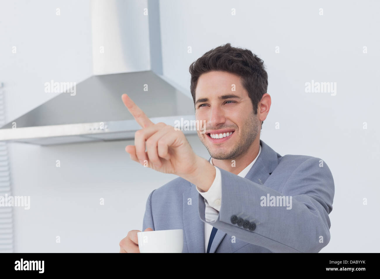 Businessman waving à quelqu'un Banque D'Images