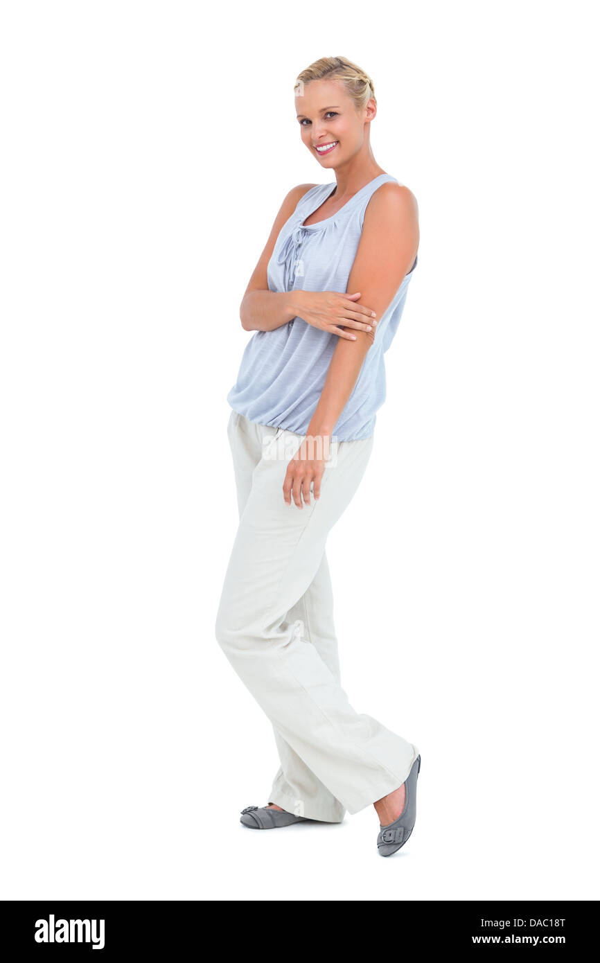 Blonde woman looking at camera and smiling Banque D'Images