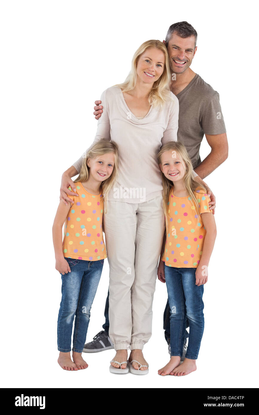 Happy Family smiling at the camera Banque D'Images