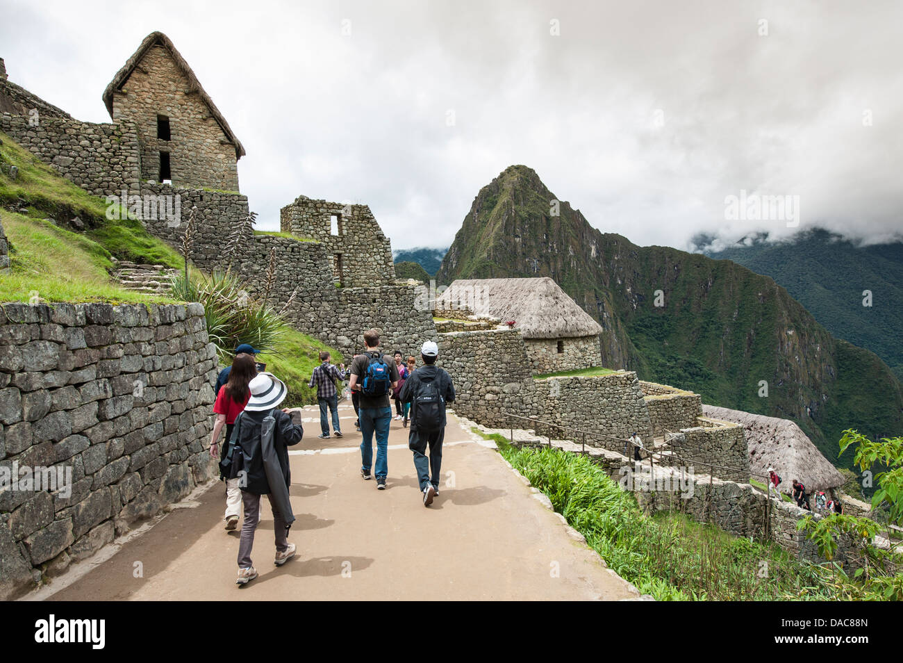Machu Picchu, site du patrimoine mondial de l'ancienne demeure de pierre Inca ruins, Aguas Calientes, Pérou. Banque D'Images