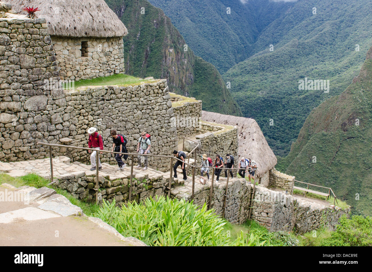 Machu Picchu, site du patrimoine mondial de l'ancienne demeure de pierre Inca ruins, Aguas Calientes, Pérou. Banque D'Images