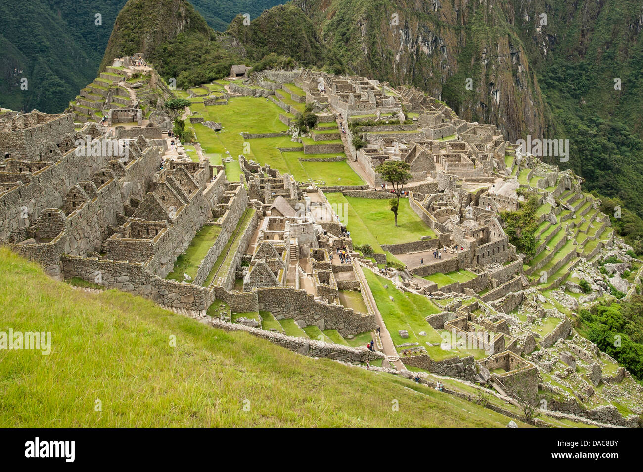 Machu Picchu, site du patrimoine mondial de l'ancienne demeure de pierre Inca ruins, Aguas Calientes, Pérou. Banque D'Images