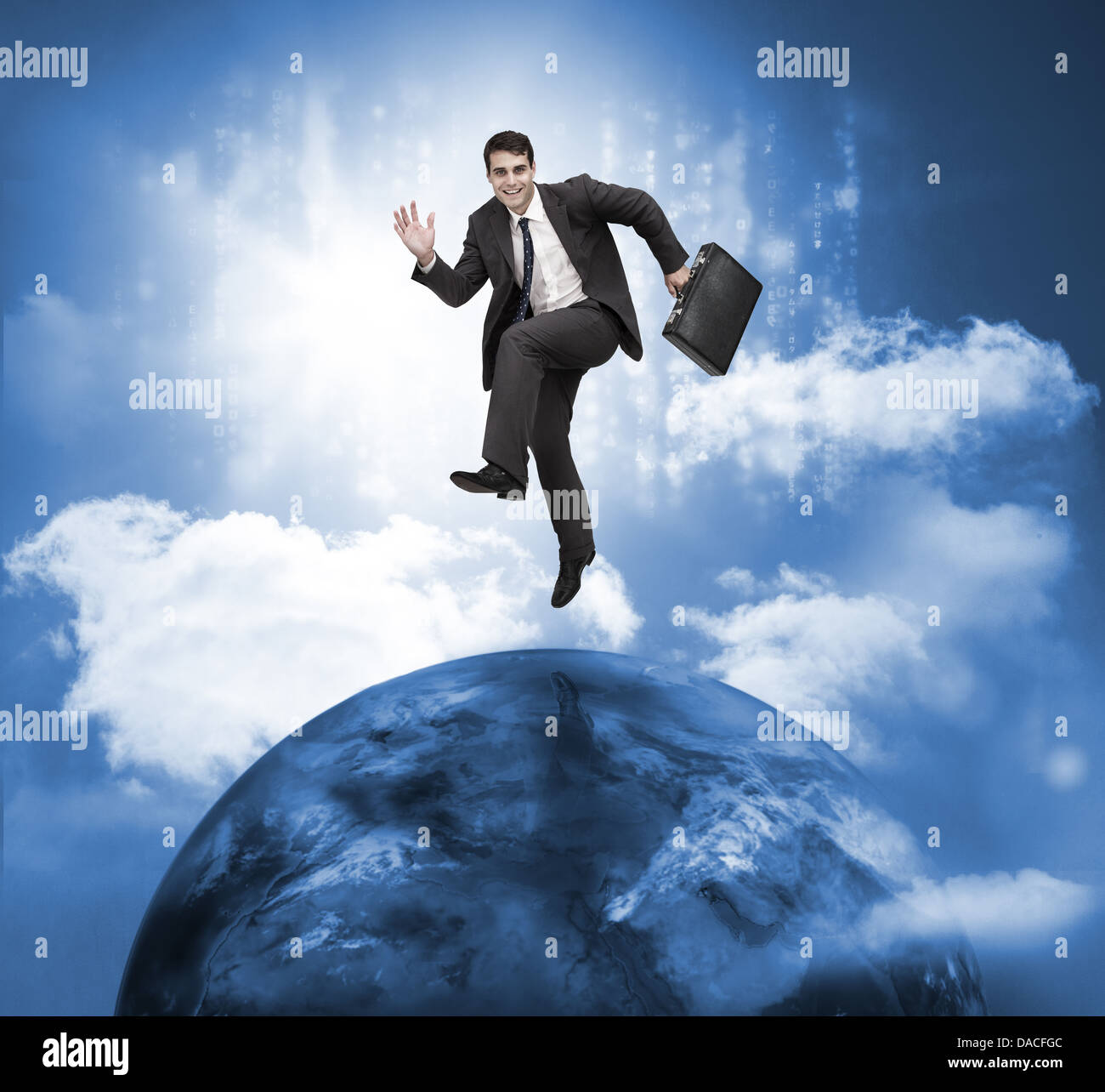 Businessman jumping over a planet Banque D'Images