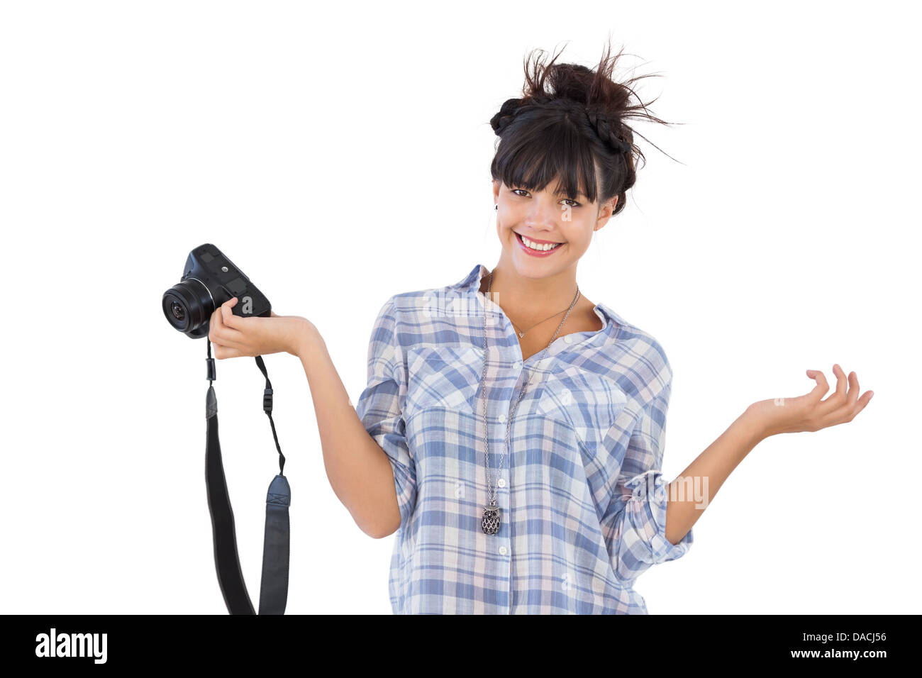 Belle femme souriante avec son appareil photo Banque D'Images