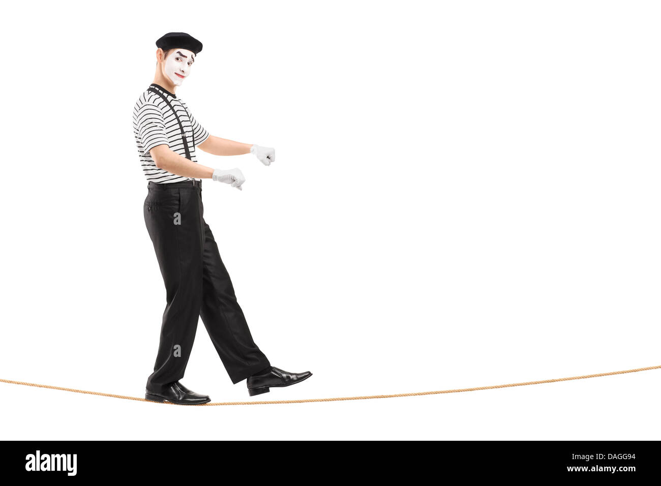 Portrait d'un homme mime marche sur une corde et l'équilibrage Banque D'Images