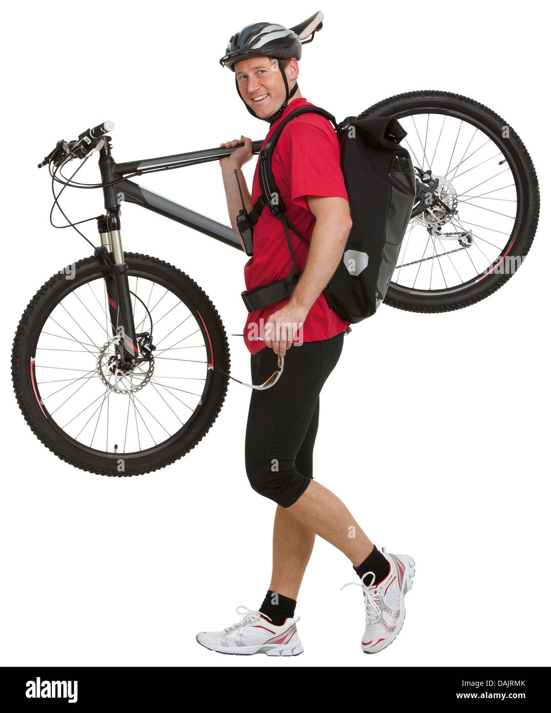 Portrait de courier man carrying bicycle, smiling Banque D'Images