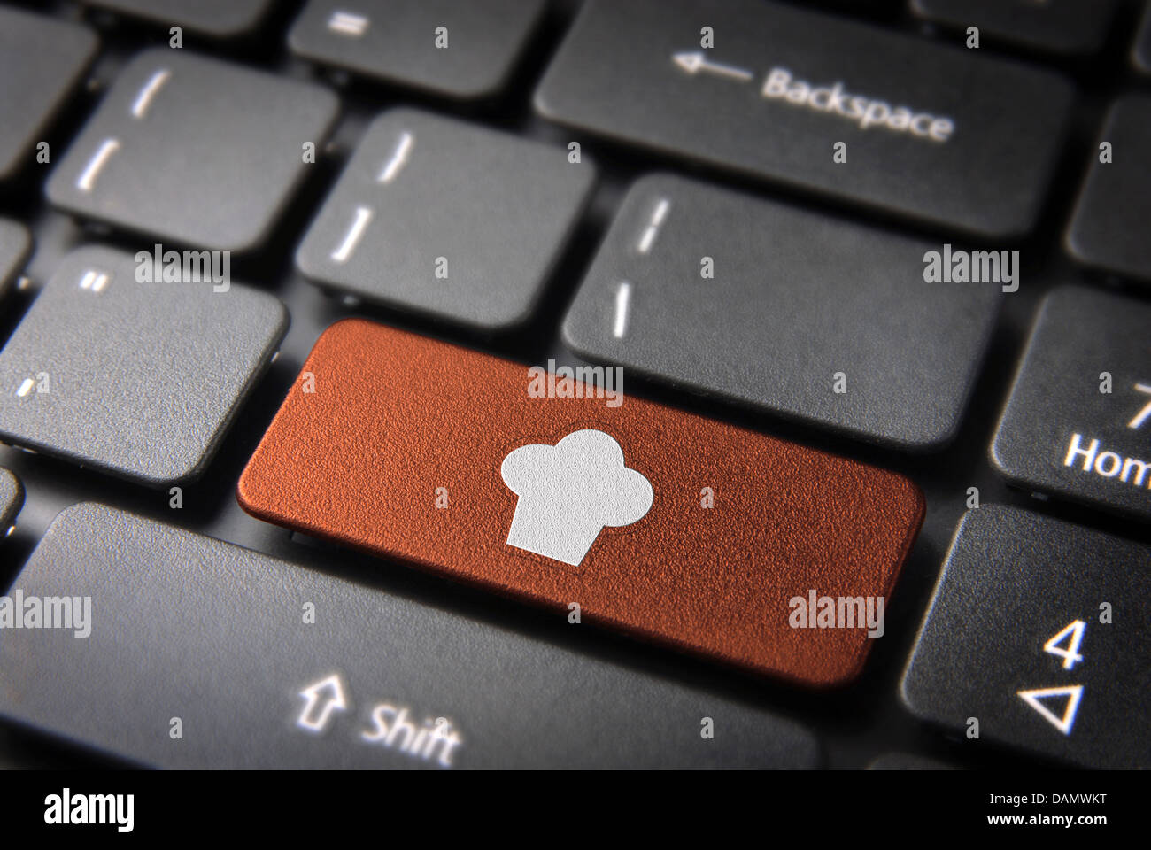 Touche gastronomique avec le Chef hat icône sur clavier d'ordinateur portable. Inclus chemin de détourage, de sorte que vous pouvez facilement le modifier. Banque D'Images