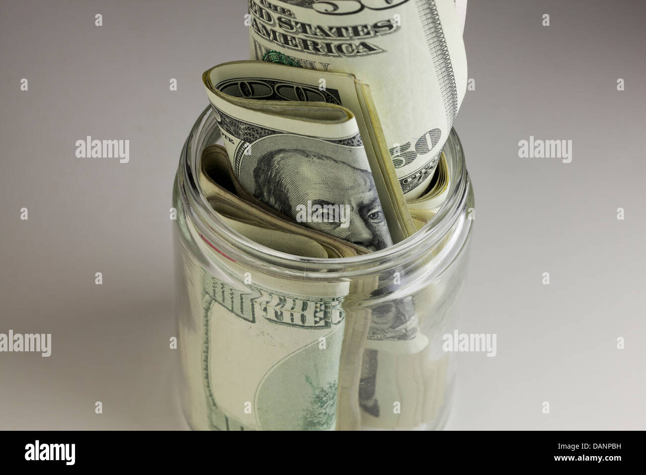 L'argent dans les petits farcis bocal en verre Banque D'Images