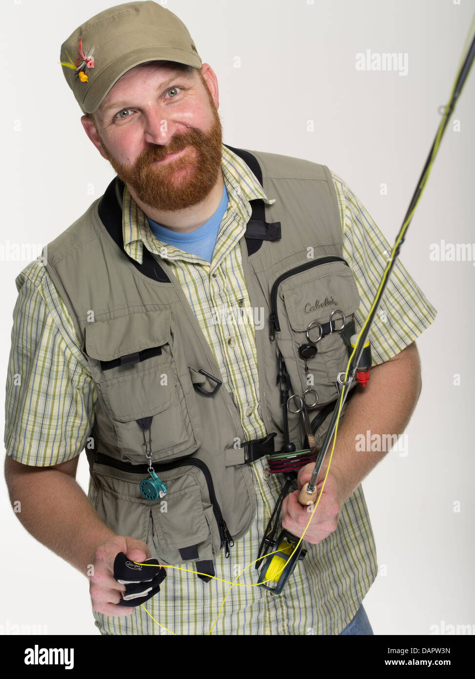 La pêche à la mouche / angler avec rod et net Banque D'Images