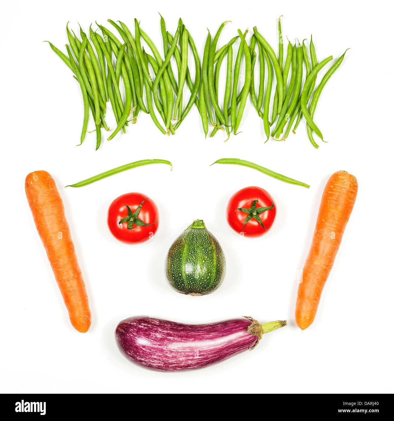 Visage heureux, légumes sur fond blanc Banque D'Images