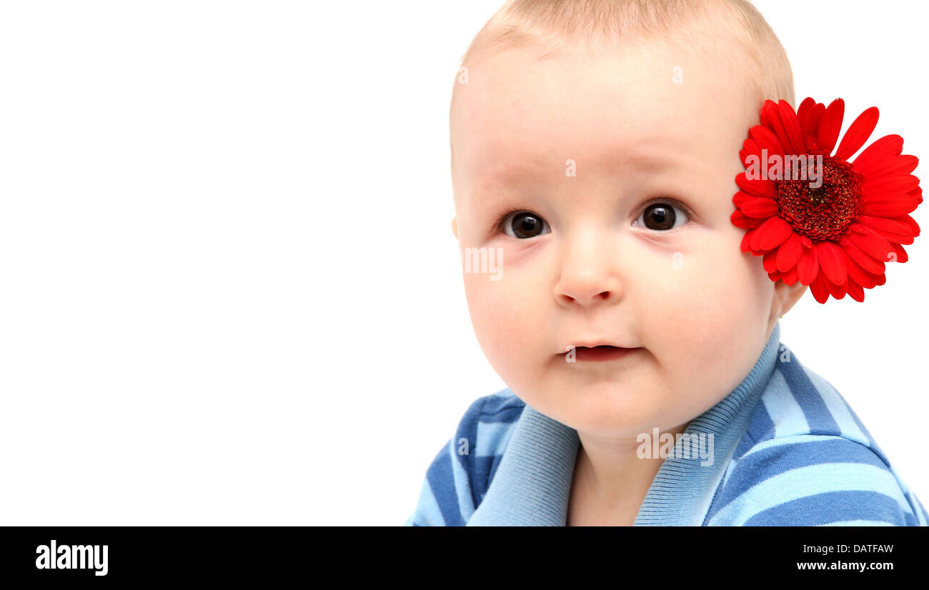 Portrait d'un bébé avec une fleur Banque D'Images