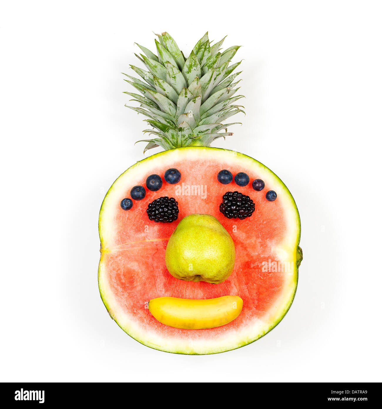 Funny fruit isolé face over white background Banque D'Images