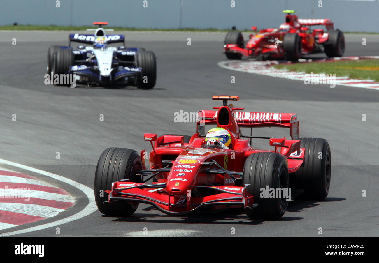 Pilote de formule 1 finlandais Kimi Raikkonen de Ferrari steers sa voiture en face de l'Allemand Nico Rosberg (C) de Williams et le Brésilien Felipe Massa (R) de Ferrari lors du Grand Prix du Canada, Montréal, Canada, 10 juin 2007. Photo : GERO BRELOER Banque D'Images