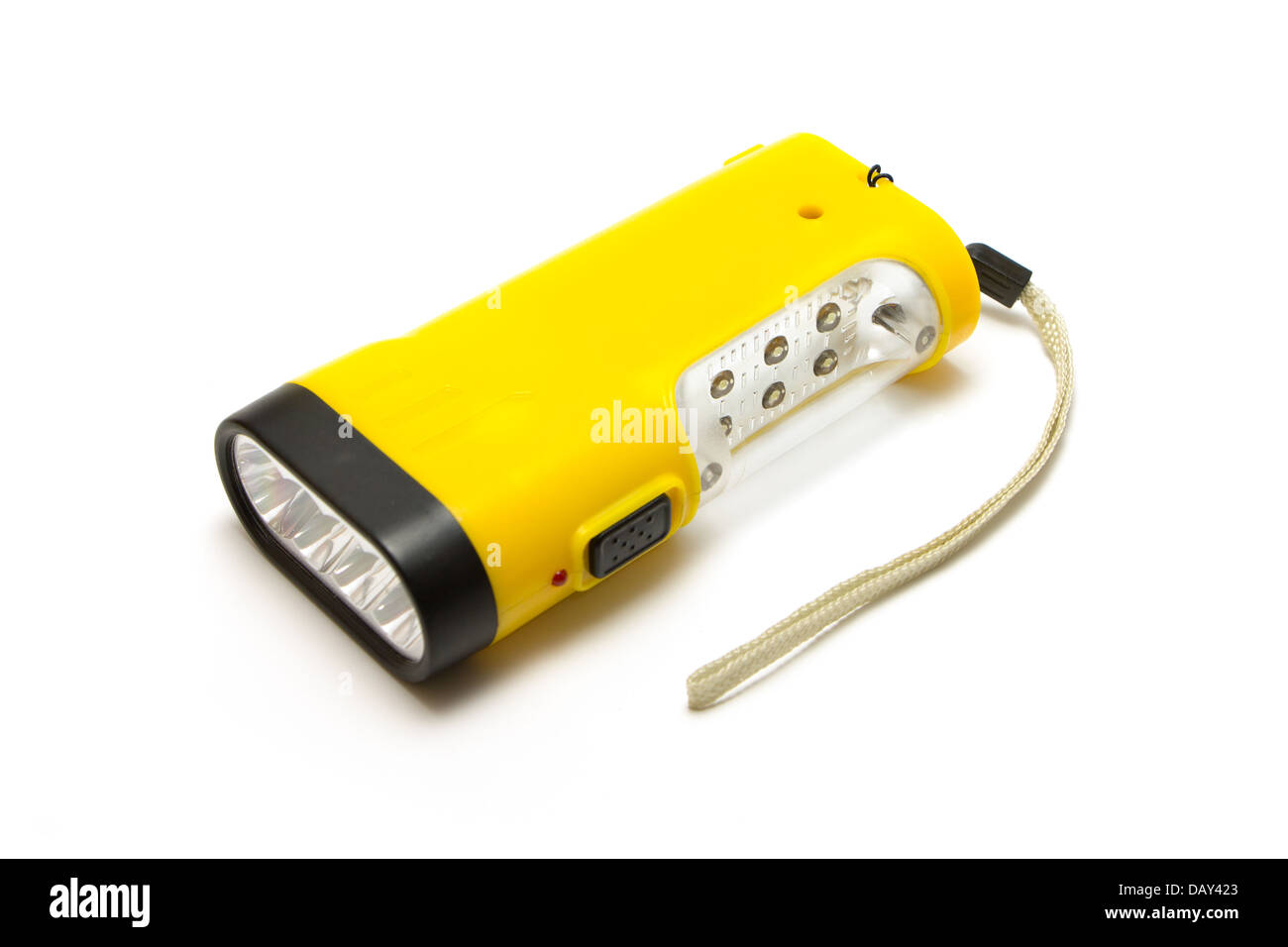 Lampe de poche électrique jaune sur fond blanc. Banque D'Images