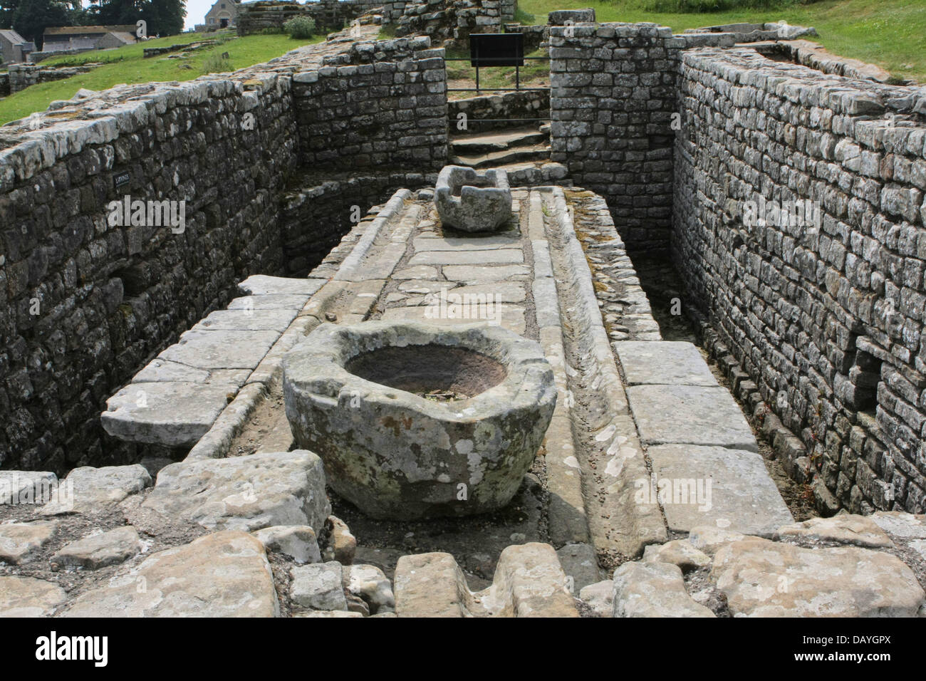 Toilettes communales romain à Housteads Fort sur mur d'Hadrien Banque D'Images