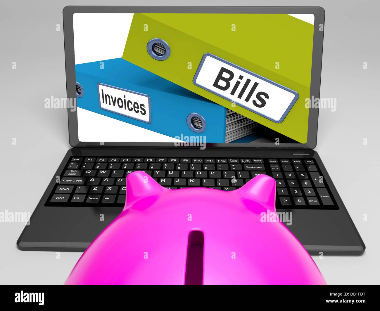 Des factures et des fichiers sur ordinateur portable montre Finances publiques Banque D'Images