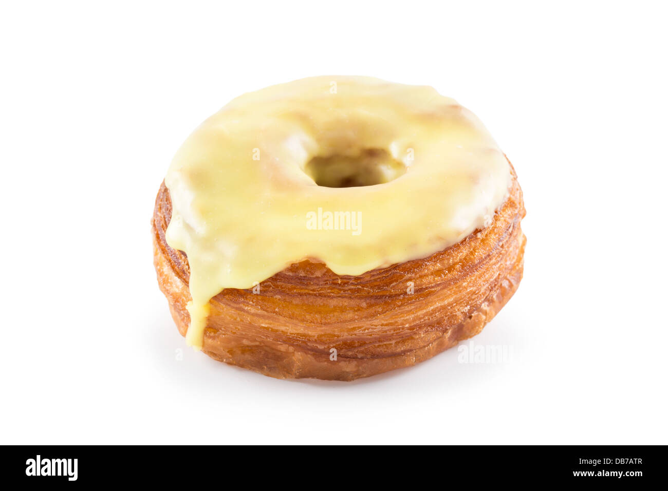 Le fondant jaune croissant et mélange donut isolated on white Banque D'Images