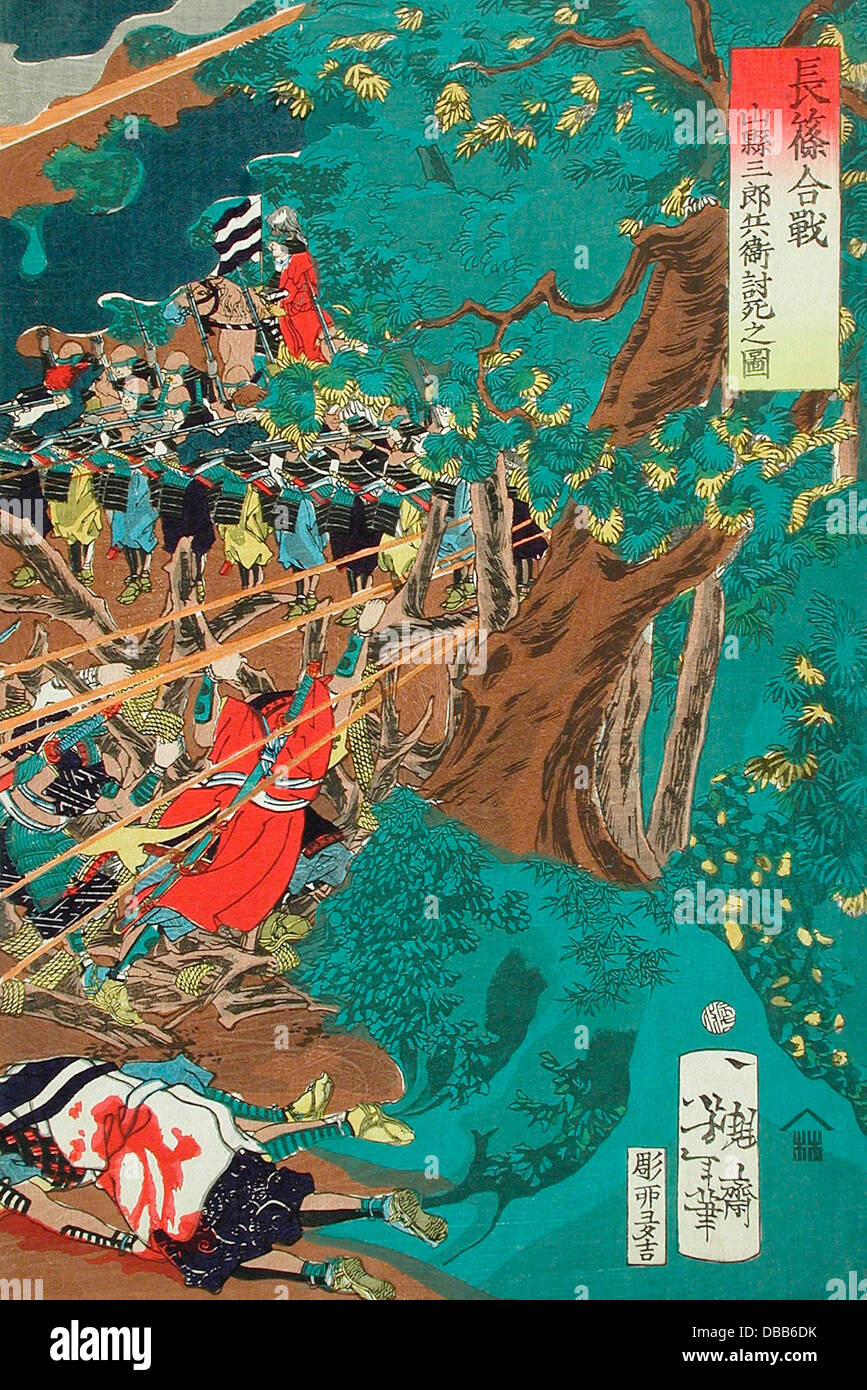 Cette œuvre représente la bataille de Nagashino, un événement historique clé de la période Sengoku au Japon, mettant en valeur la guerre des samouraïs. La pièce met en lumière les tactiques de combat dramatiques et le contexte culturel de la période. Banque D'Images