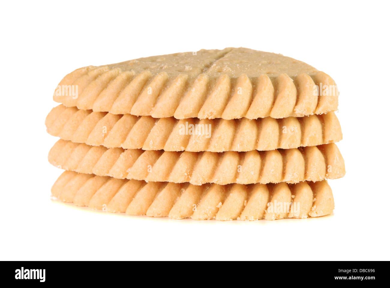 Pile de quatre morceaux de shortbread sur fond blanc Banque D'Images
