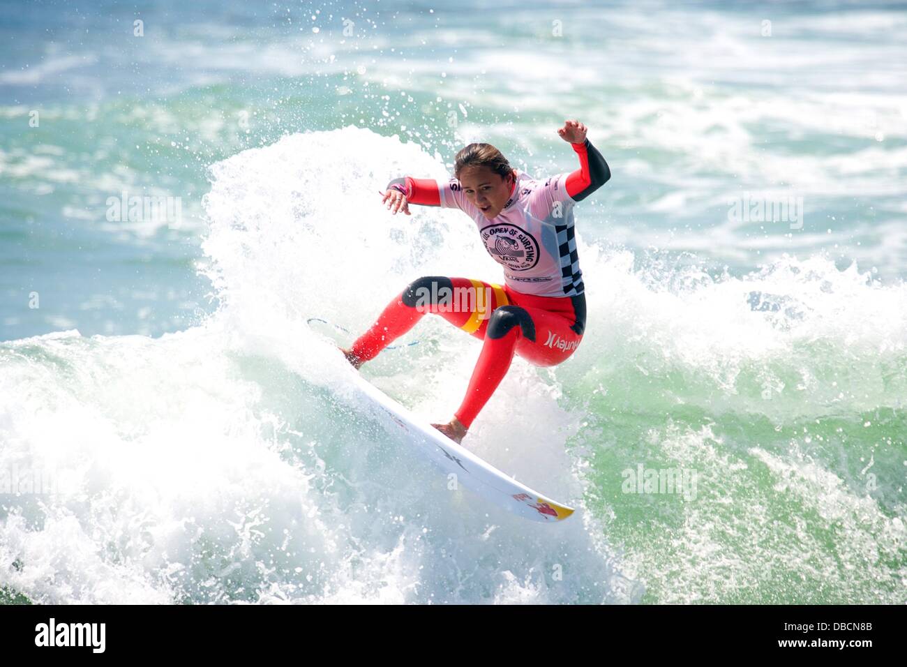 Huntington Beach, CA, USA. 28 juillet, 2013. Le 28 juillet 2013 : Carissa Moore à partir d'Hawaï, monte un vague pendant sa chaleur pendant la Cars US Open de surf concours à Huntington Beach, CA. Credit : csm/Alamy Live News Banque D'Images