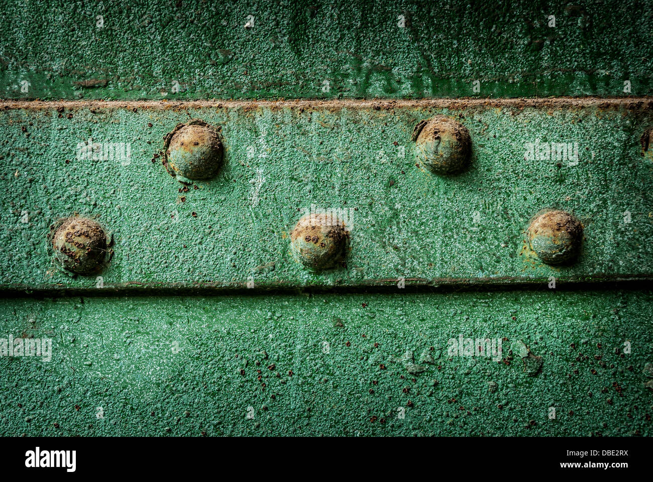 Rivet industriel fonte rouille et peinture verte grunge peeling  d'arrière-plan Photo Stock - Alamy
