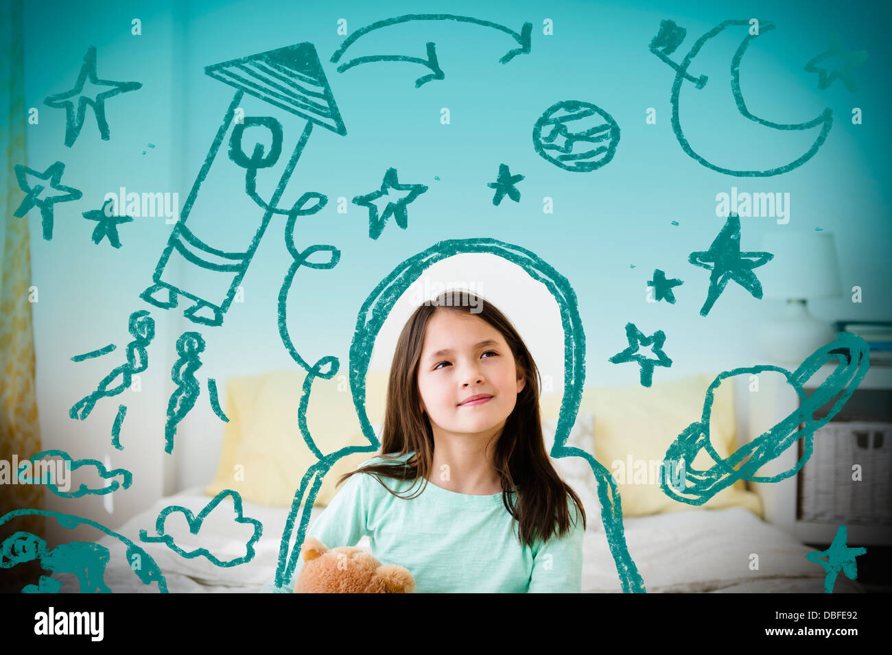 Mixed Race girl with space doodles entourant head Banque D'Images