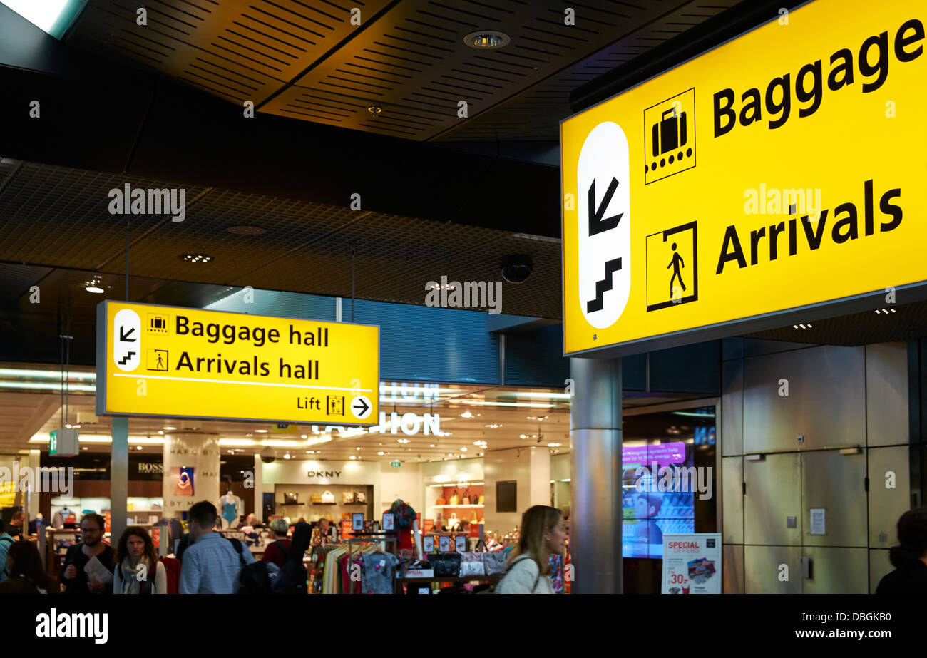 Hall d'arrivée des bagages et signe. L'aéroport d'Amsterdam Schiphol. Banque D'Images